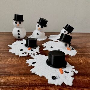Melted Snowman Figurines with Black Hats